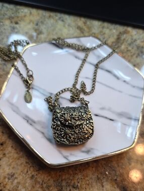 Cake Gold Floral Textured Purse Necklace
